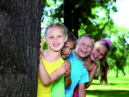 Children playing in the summer park